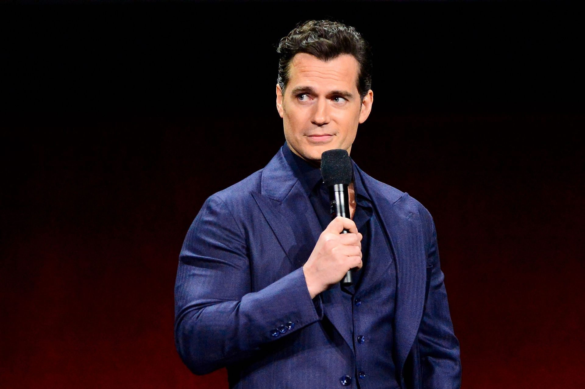 Henry Cavill at CinemaCon 2024 (via Getty/Jerod Harris)