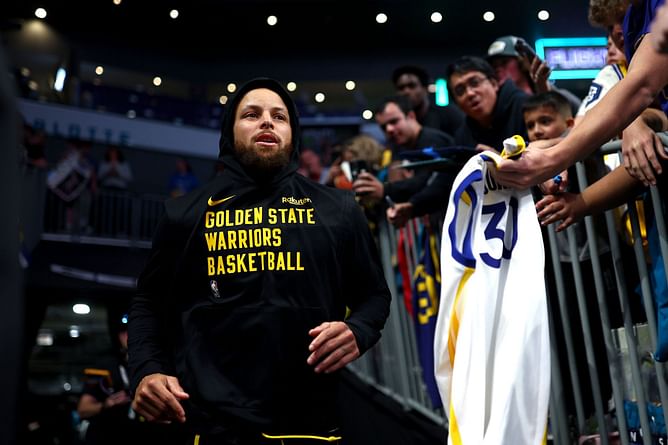 Former Warriors GM puts Steph Curry in league of Magic Johnson for unique leadership prowess