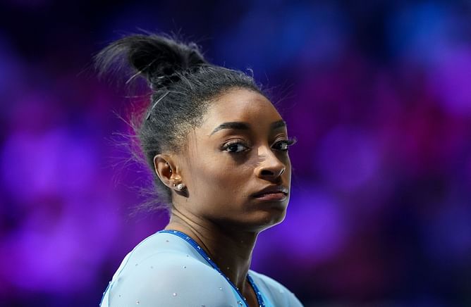 Simone Biles lashes out at a fan for poking fun at the NCAA gymnastics semifinals night session