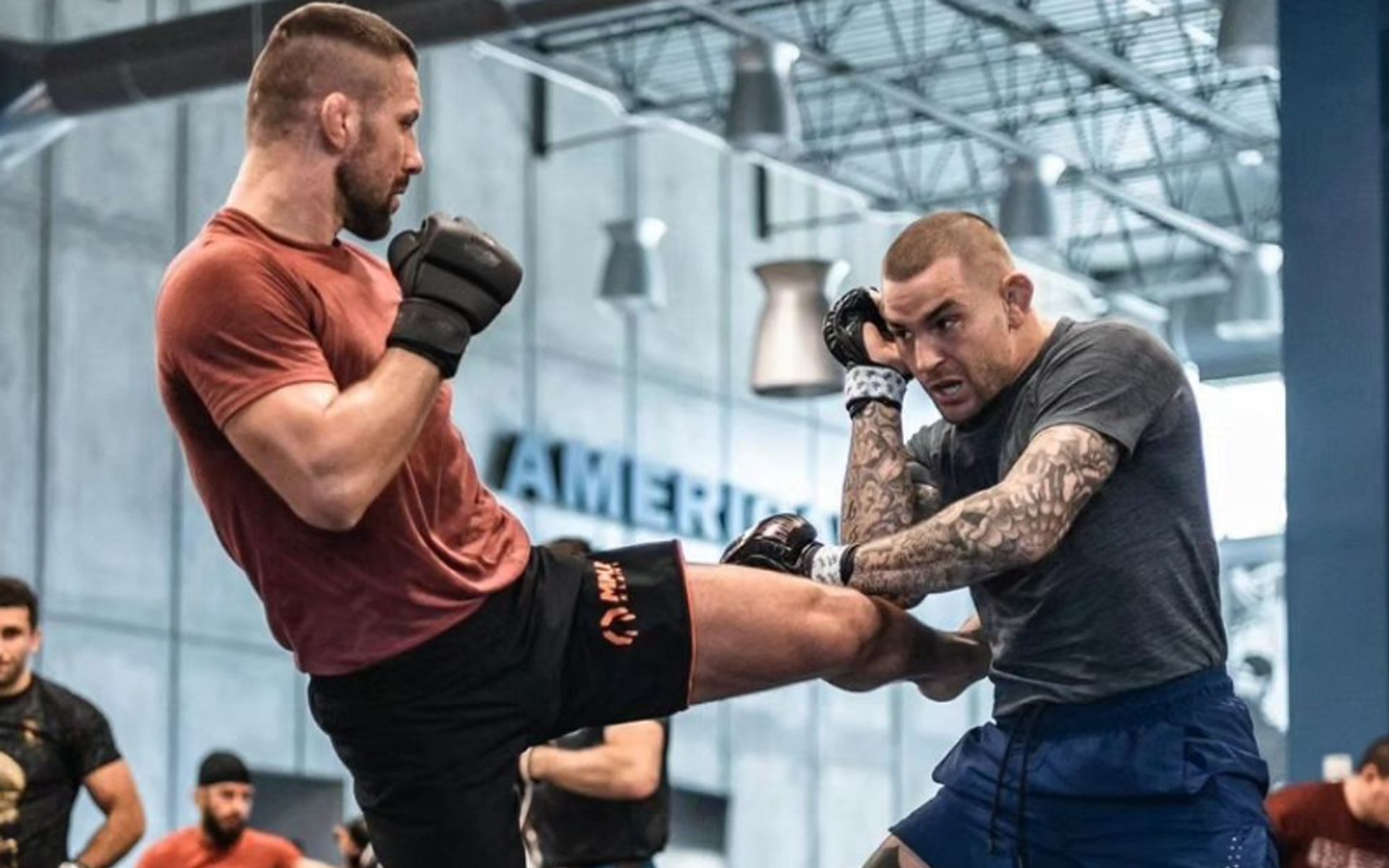 Dustin Poirier (right) during a sparring session with fellow lightweight Mateusz Gamrot (left) at the famed training academy [Image Courtesy: @dustinpoirier Instagram]
