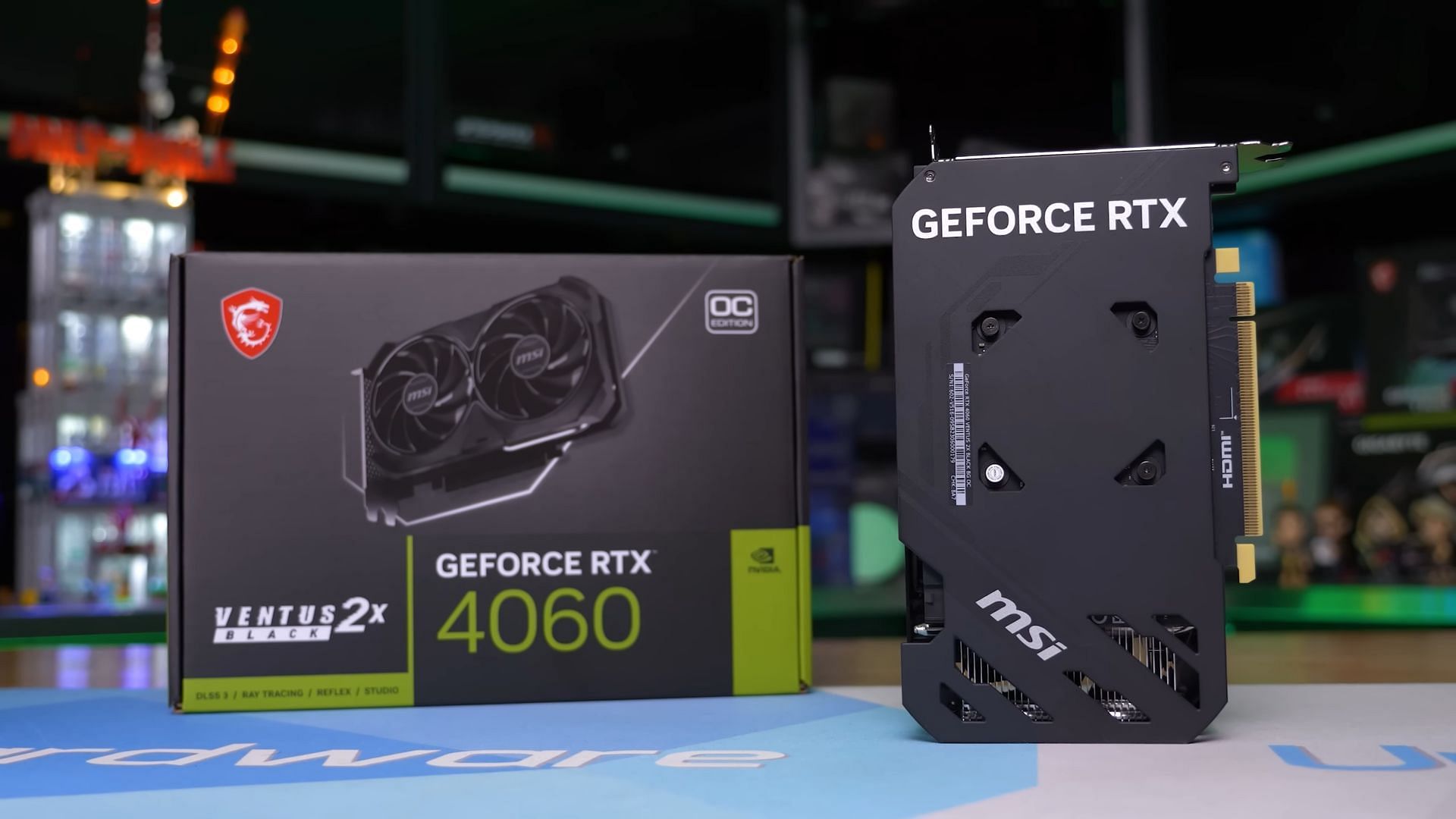 The RTX 4060 GPU with its box package (Image via Hardware Unboxed/YouTube)