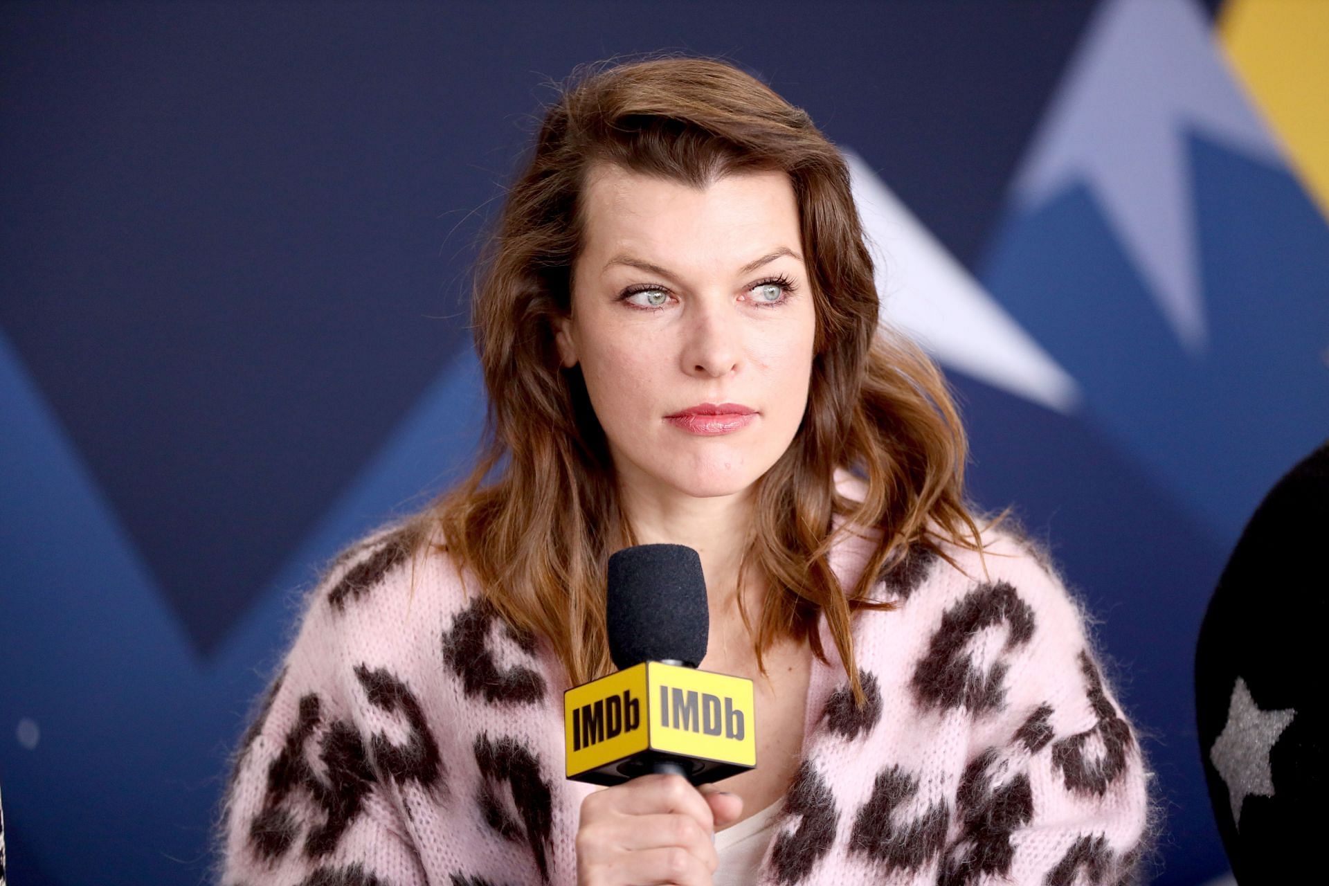 Milla in conversation at the IMDb Studio At Acura Festival Village On Location (Image via Getty/Rich Polk)