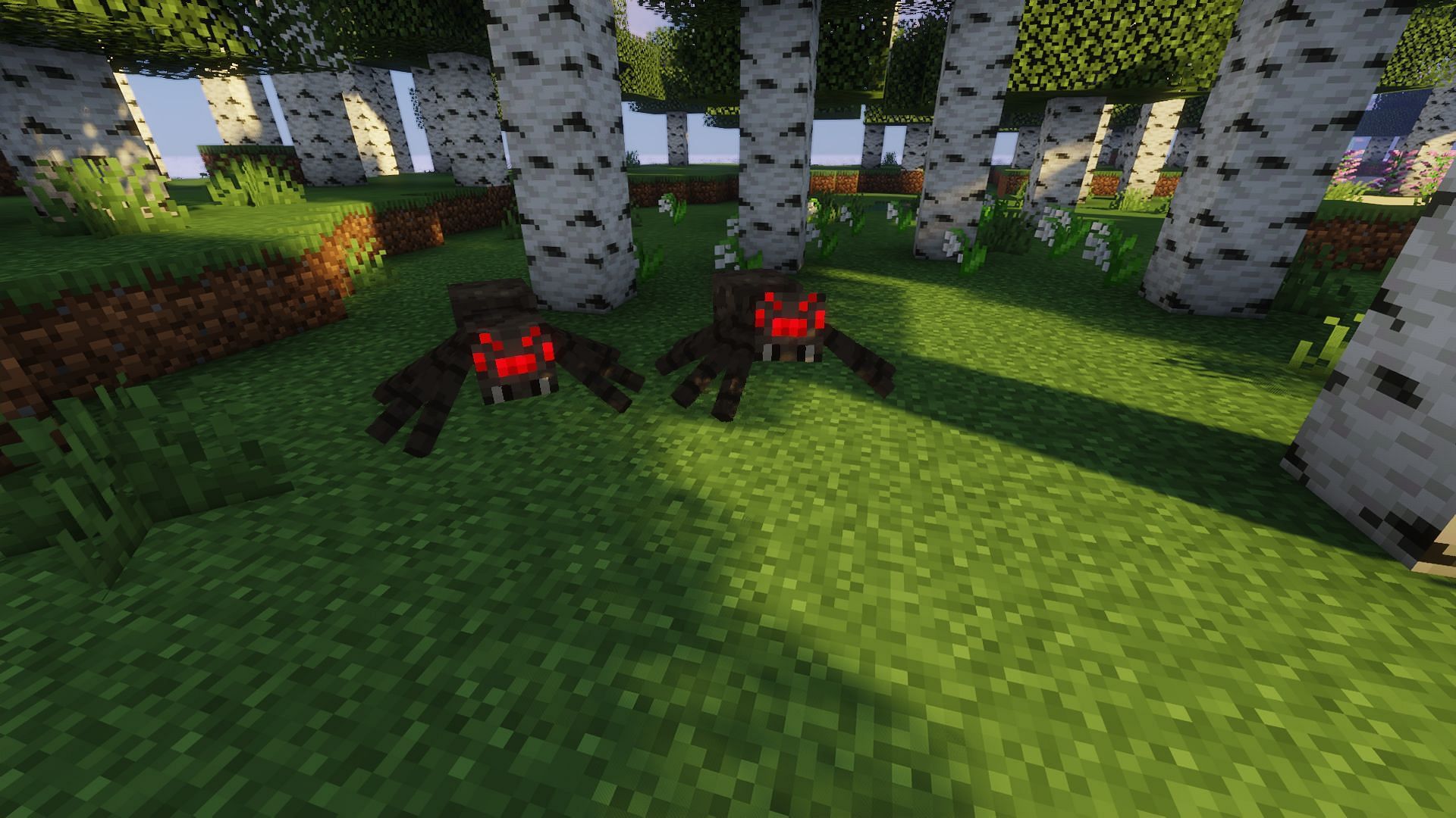 Spiders are an interesting mob as they&#039;re either hostile or passive, depending on the time (Image via Mojang)