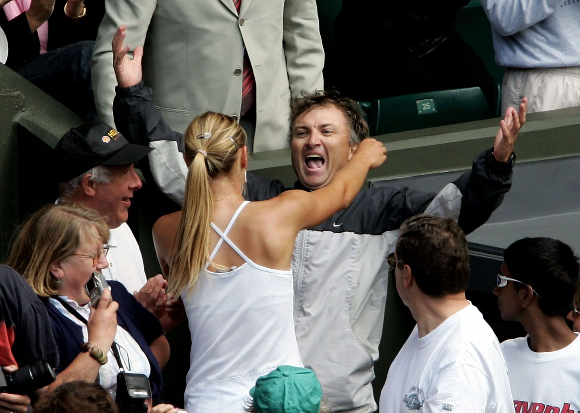 Maria Sharapova and her father celebrating after she won Wimbledon in 2004