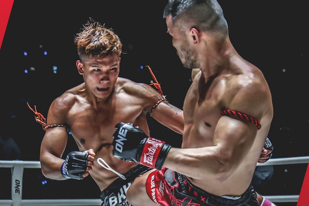 Nong-O (R) stacks praise on Kulabdam (L) after ONE Friday Fights 58 clash. -- Photo by ONE Championship
