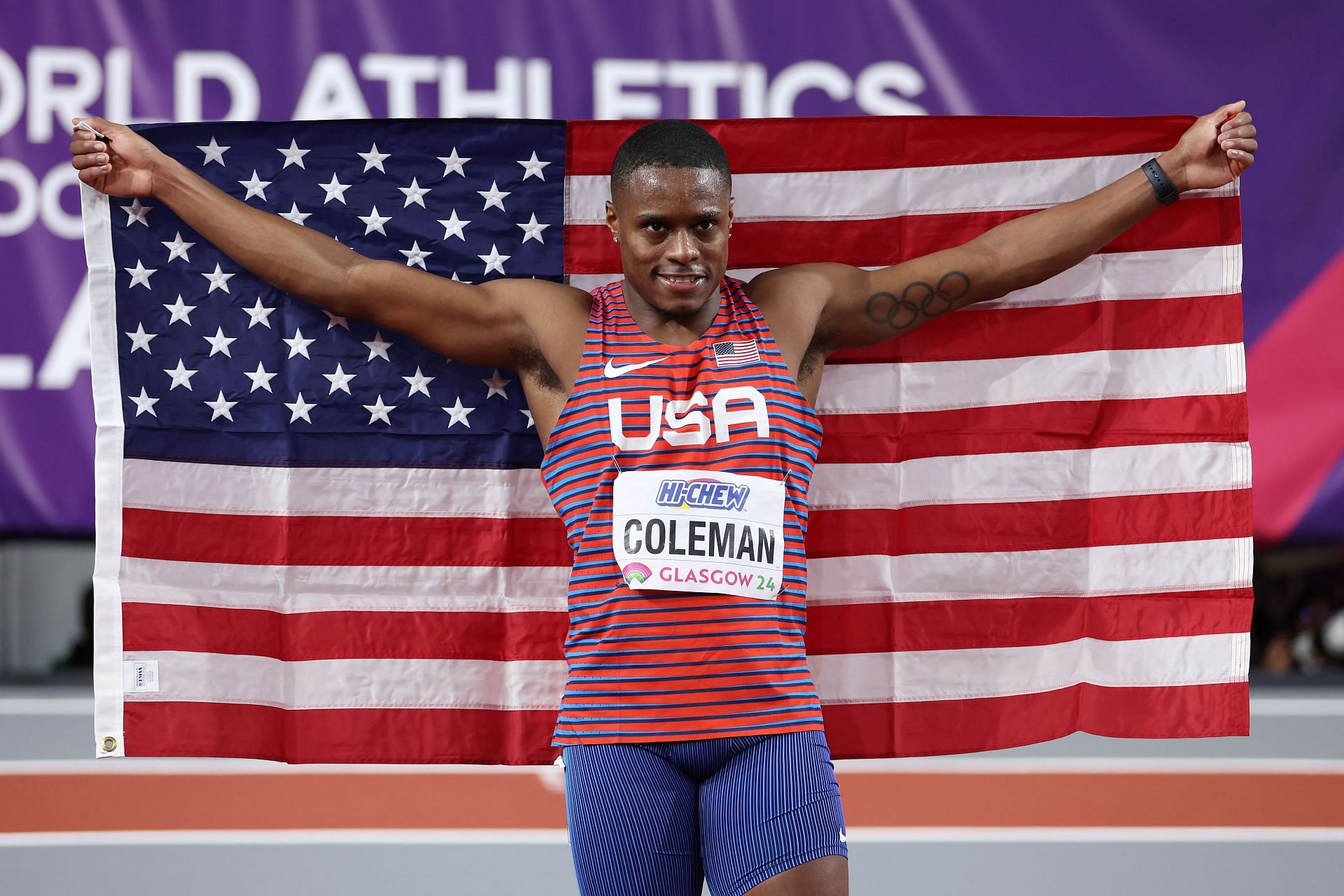 Christian Coleman celebrates winning gold at the World Indoor Championships in Glasgow