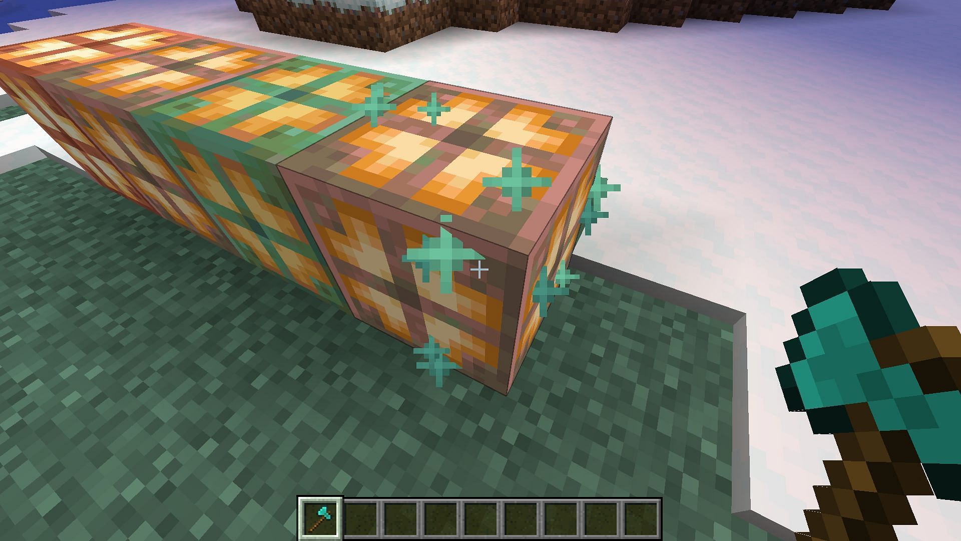 Scrape oxidation parts on the copper bulb to unlock the advancement (Image via Mojang Studios)