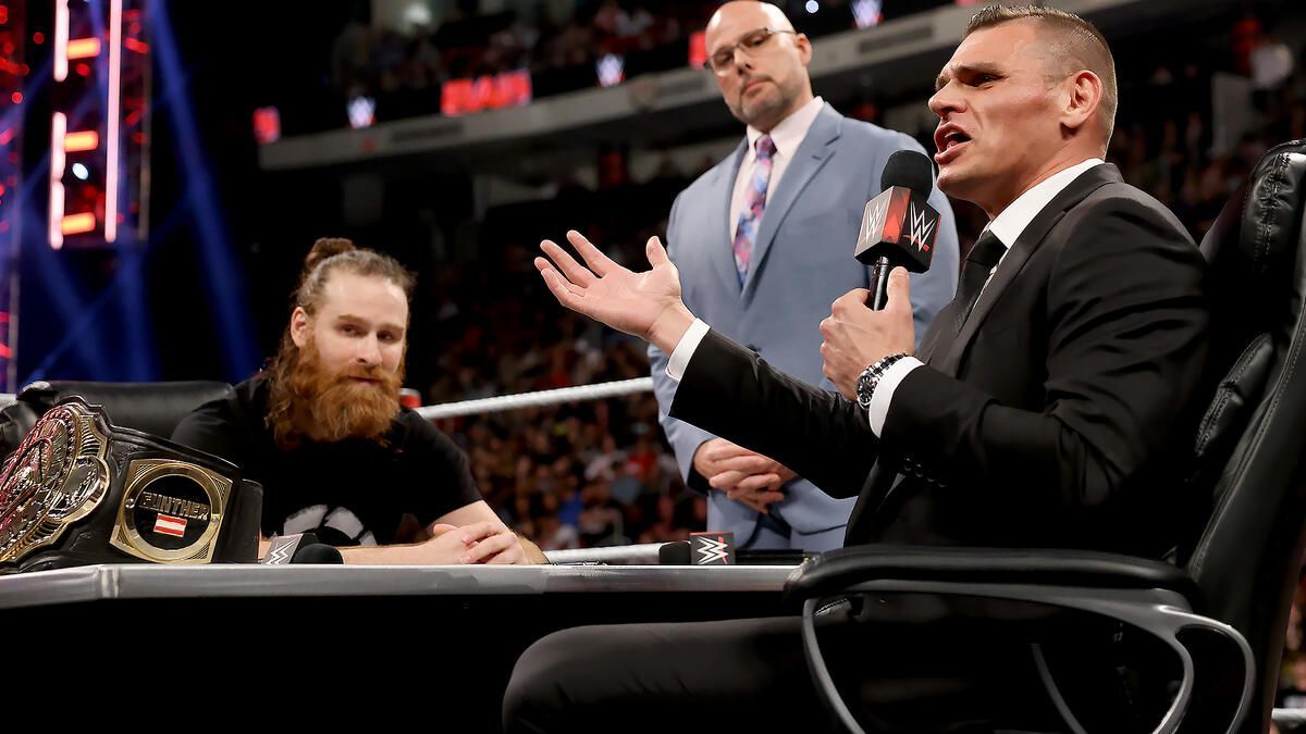 Gunther and Sami Zayn during contract signing for their WrestleMania match.