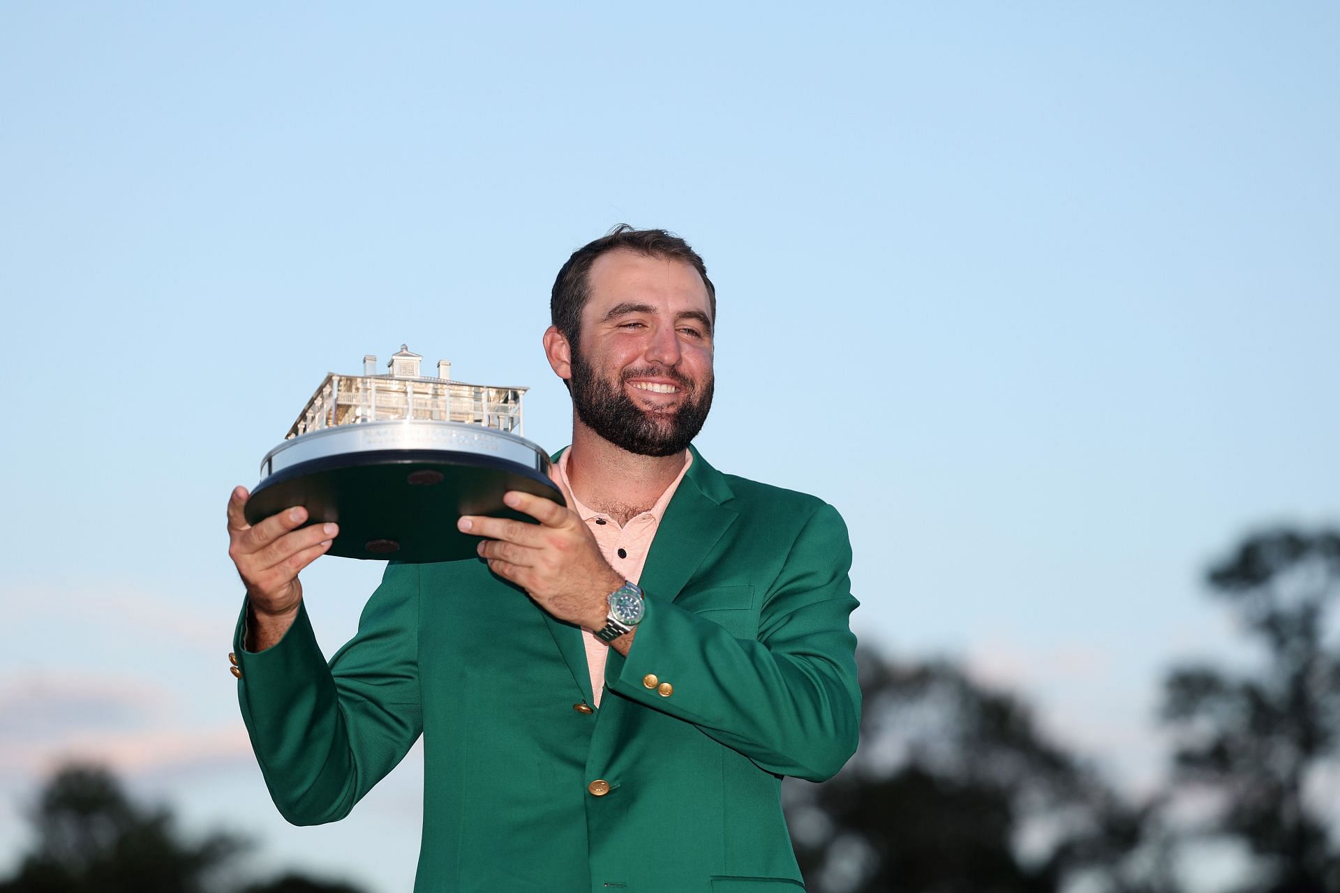Scottie Scheffler poses with the trophy after winning the Masters 2024