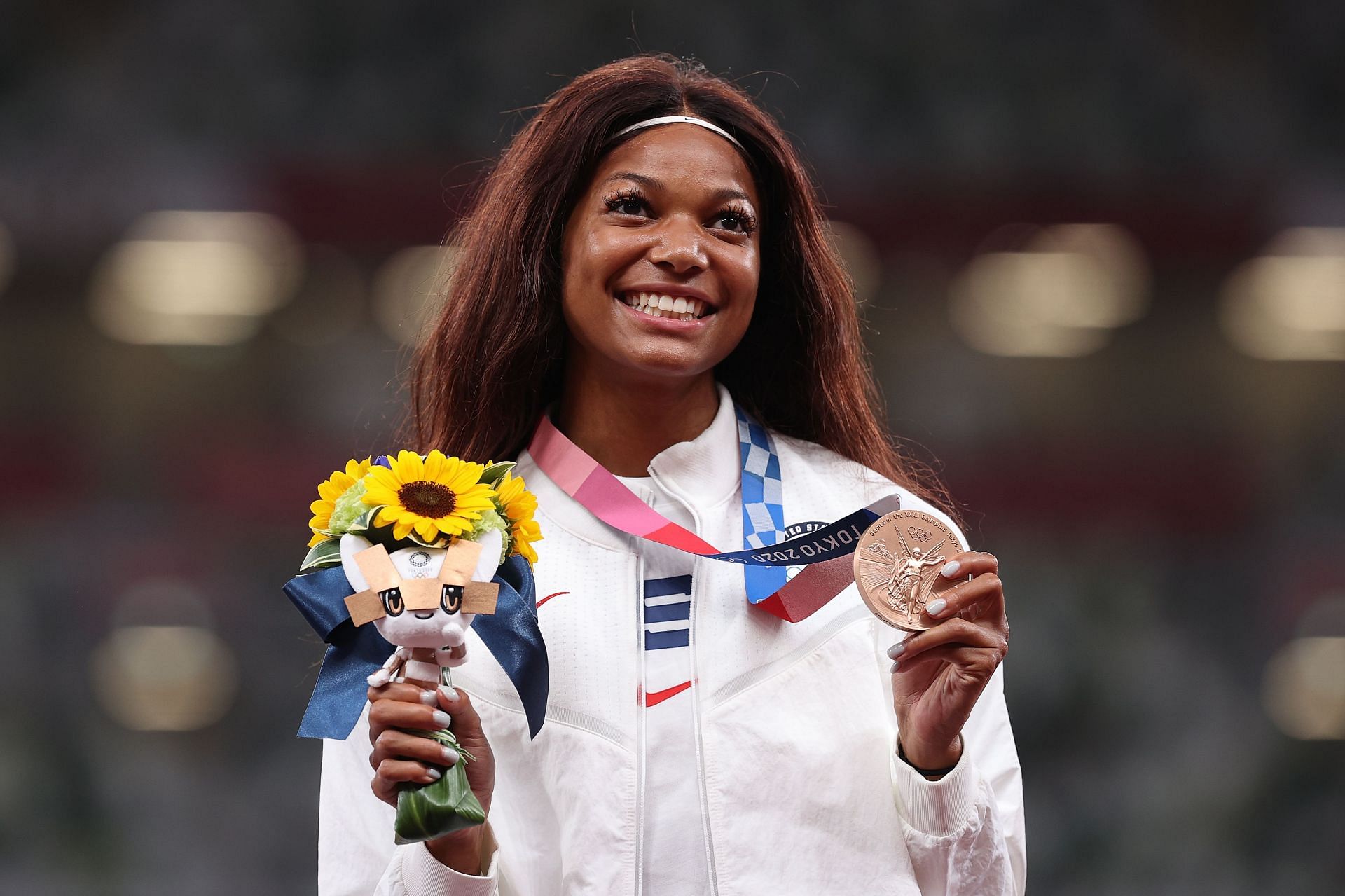 Gabby Thomas poses with the bronze medal for the Women&#039;s 200m Final at the 2020 Olympic Games in Tokyo, Japan.