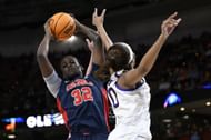Ole Miss center Rita Igbokwe grabs a rebound off LSU forward Angel Reese.