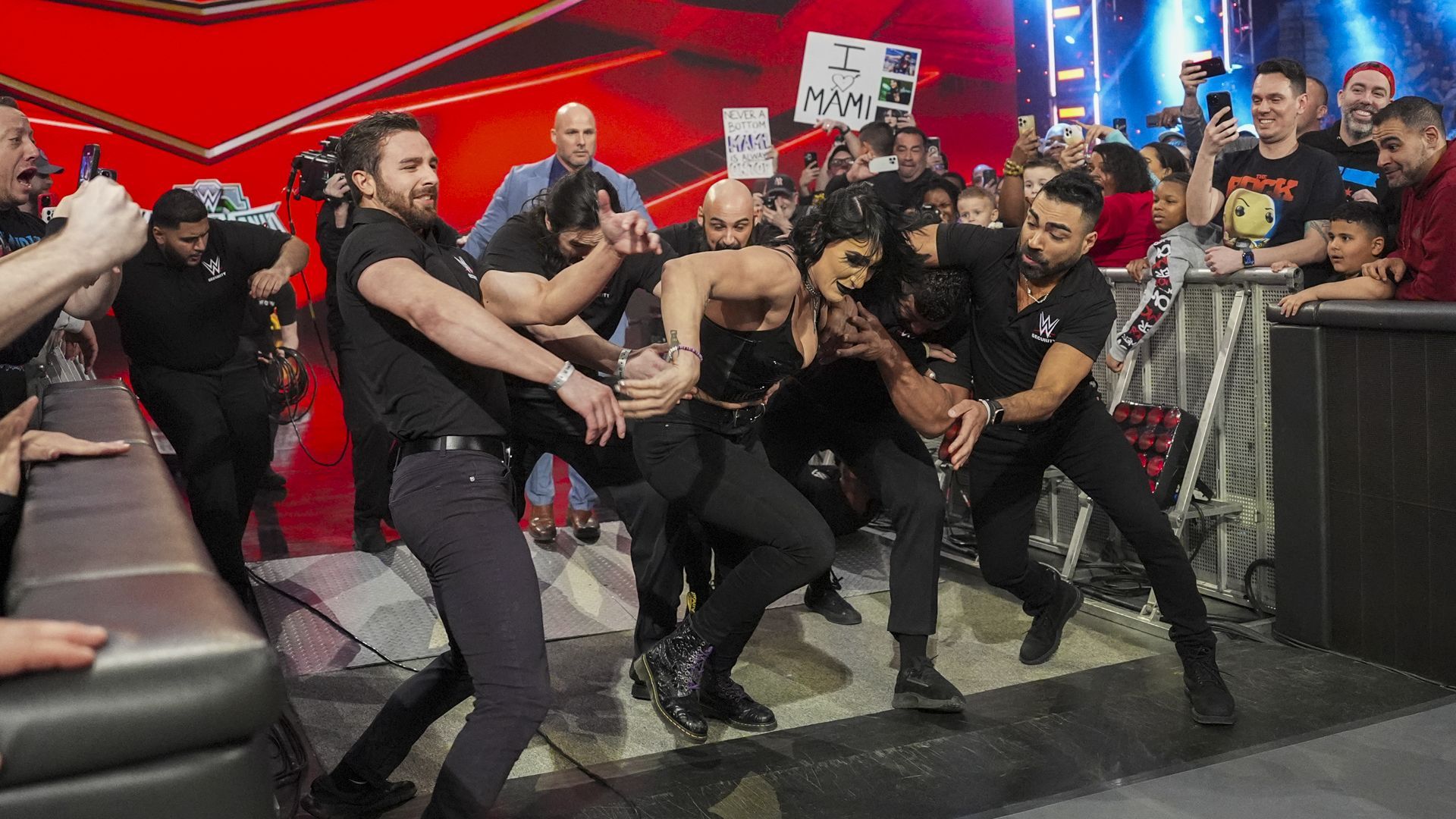 Security tries to stop Rhea Ripley from fighting Becky Lynch on WWE RAW