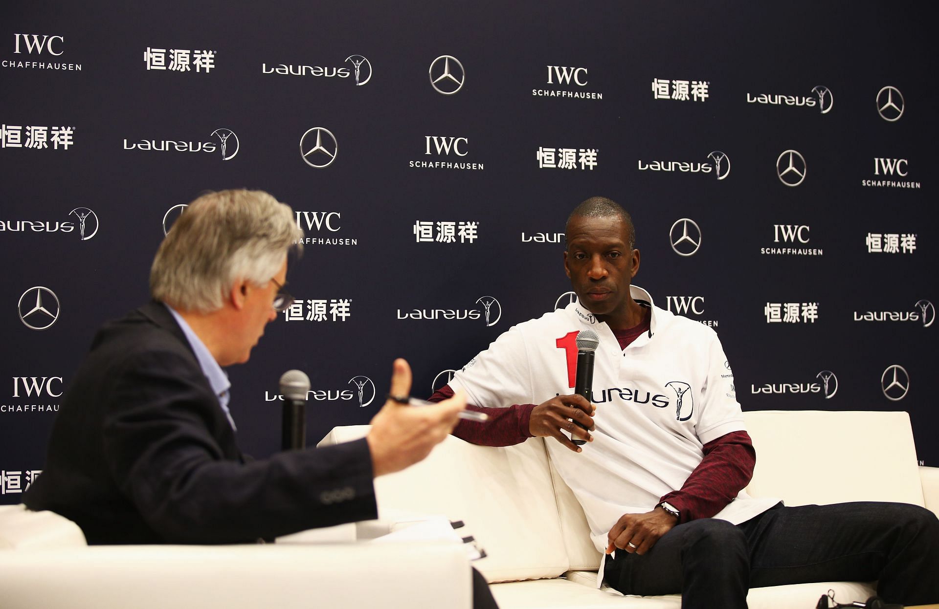 Laureus World Sports Academy member Michael Johnson speaks during a media interview at the Shanghai Grand Theatre prior to the Laureus World Sports Awards on April 14, 2015 in Shanghai, China. (Photo by Ian Walton/Getty Images for Laureus)
