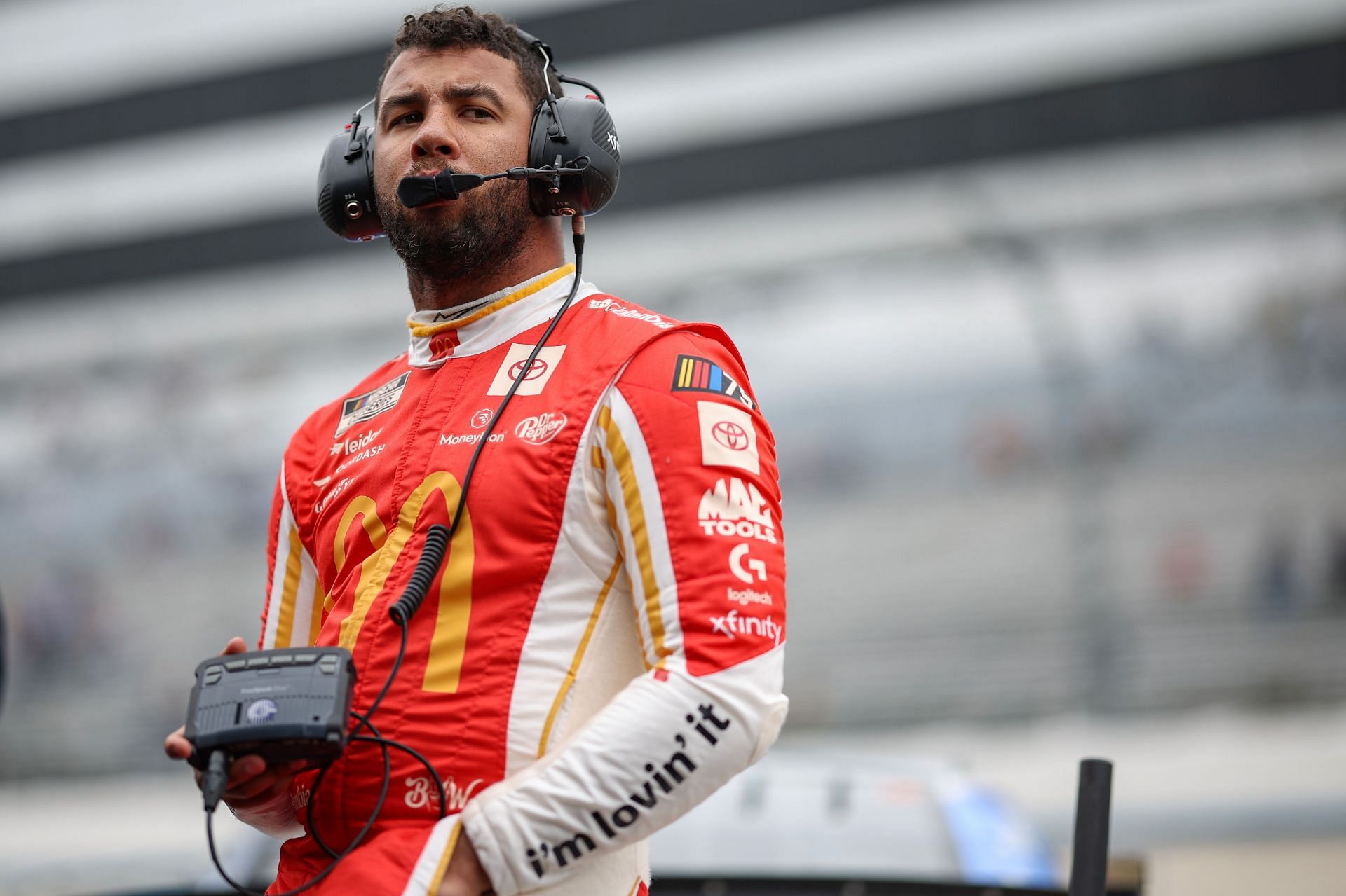 Bubba Wallace, driver of the #23 McDonald&#039;s Toyota, looks on during practice for the NASCAR Cup Series W&uuml;rth 400 at Dover International Speedway on April 29, 2023 in Dover, Delaware. (Photo by James Gilbert/Getty Images)