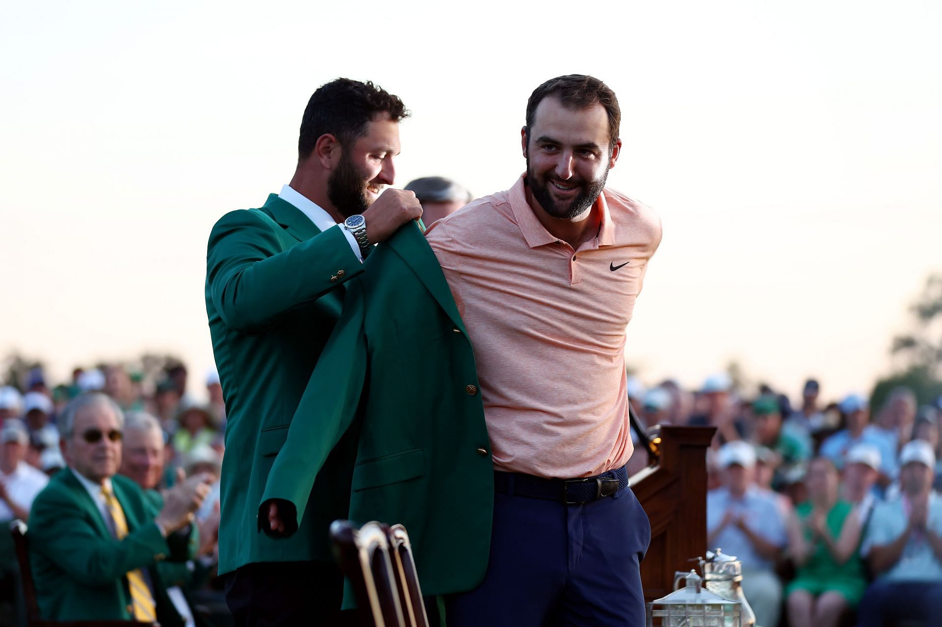 Scottie Scheffler of the United States is awarded the Green Jacket by Jon Rahm (Source: Getty Images)