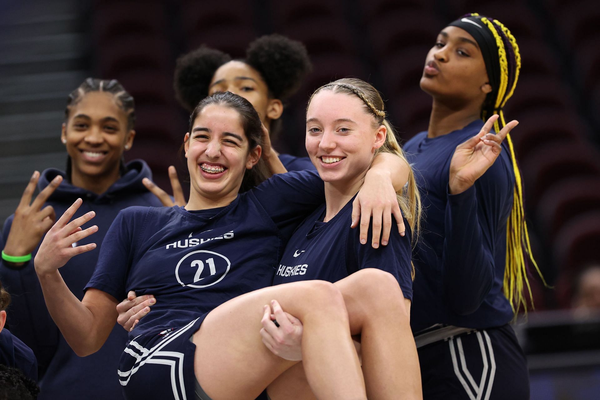 Paige Bueckers #5, Ines Bettencourt #21 and Aaliyah Edwards #3 of the Connecticut Huskies. (Photo by Steph Chambers/Getty Images)