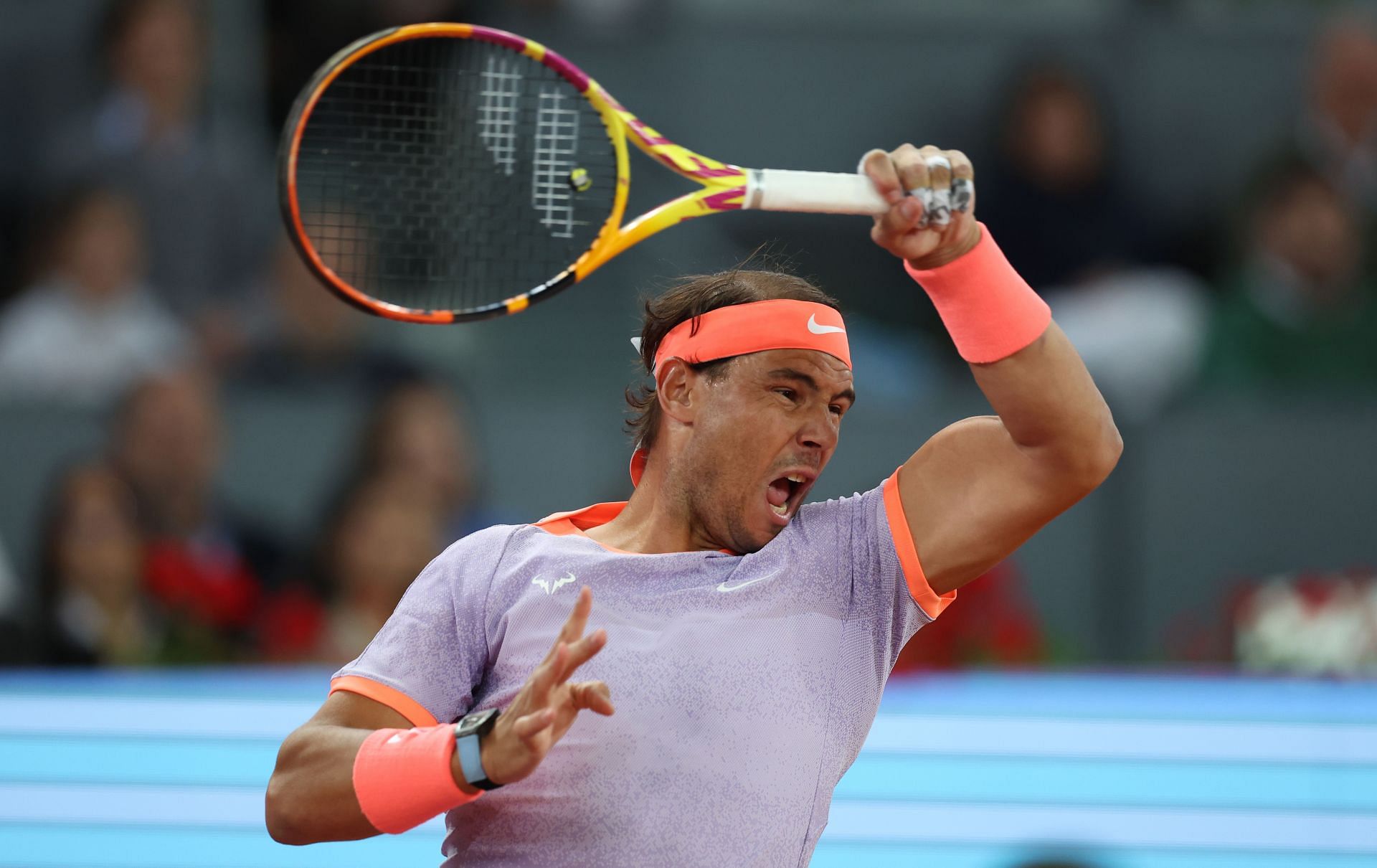 Rafael Nadal in action against Alex de Minaur at the 2024 Mutua Madrid Open