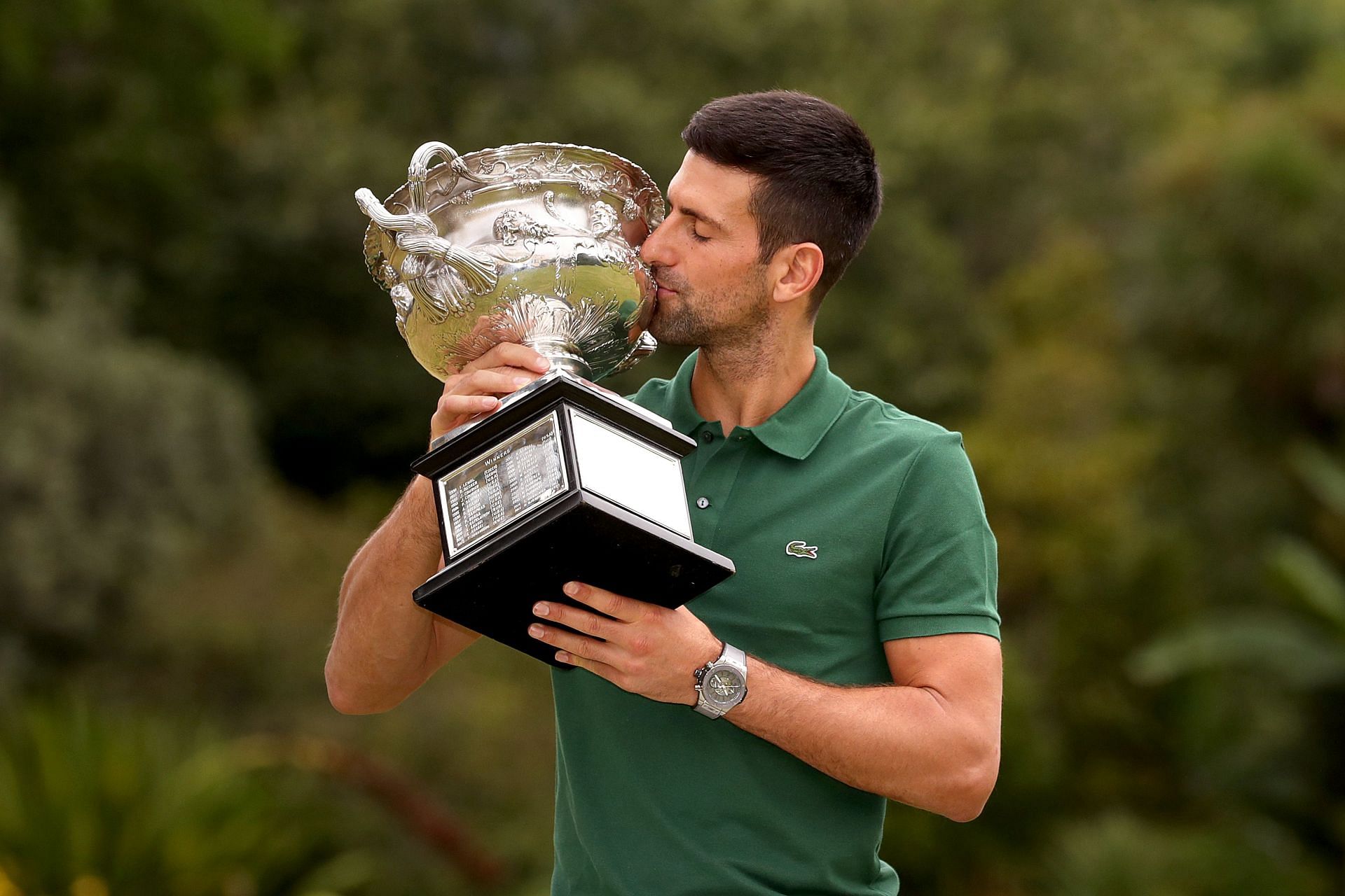 The Serb poses with the 2023 Australian Open trophy