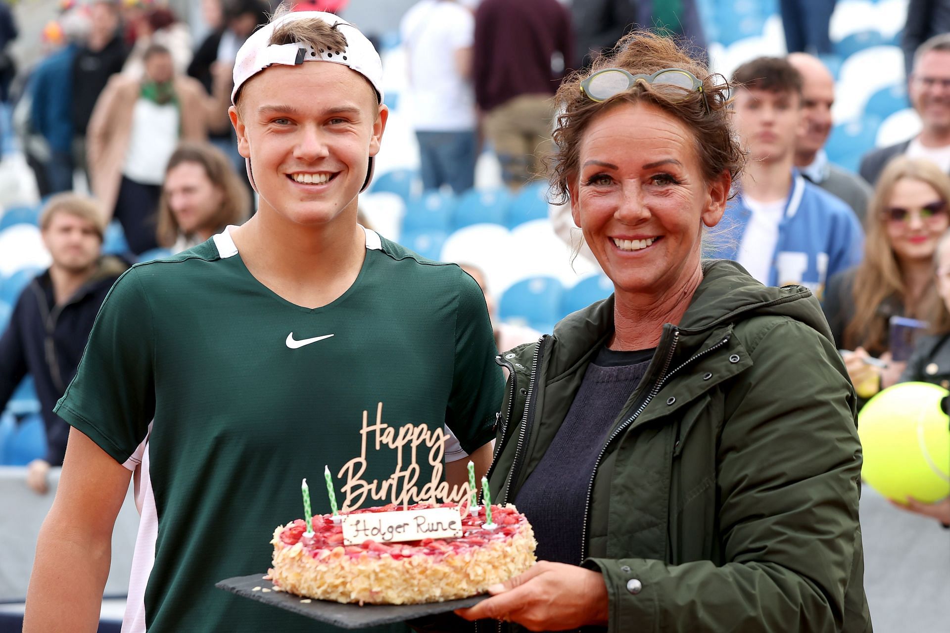 Holger Rune celebrates his 19th birthday with his mother Aneke at the 2022 BMW Open
