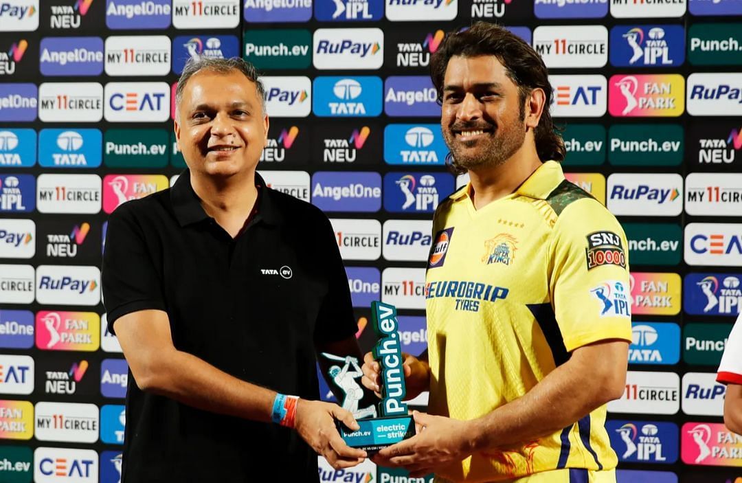 MS Dhoni receiving the Electric Striker of the Match award