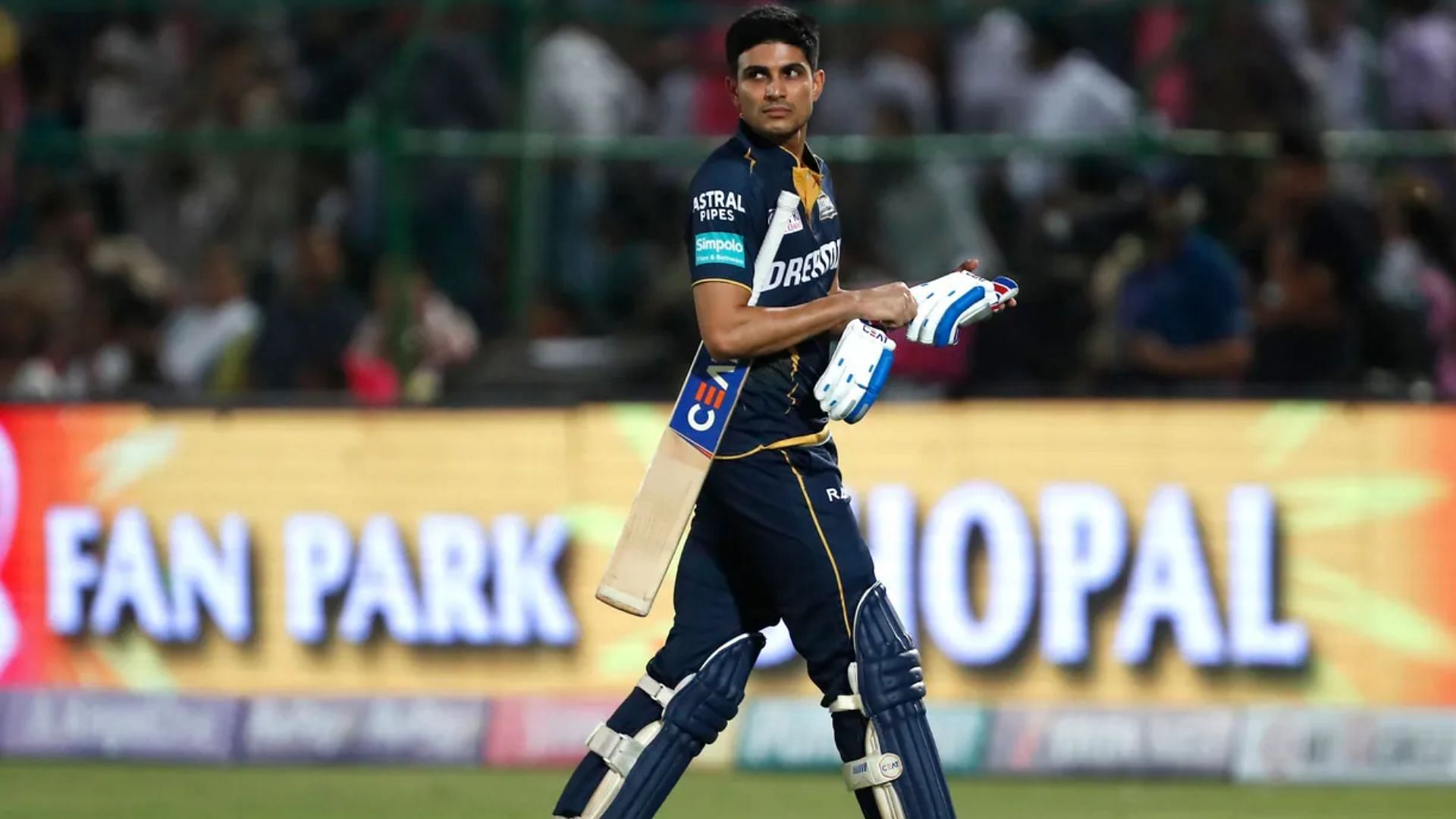 Shubman Gill walks out to the pavillion