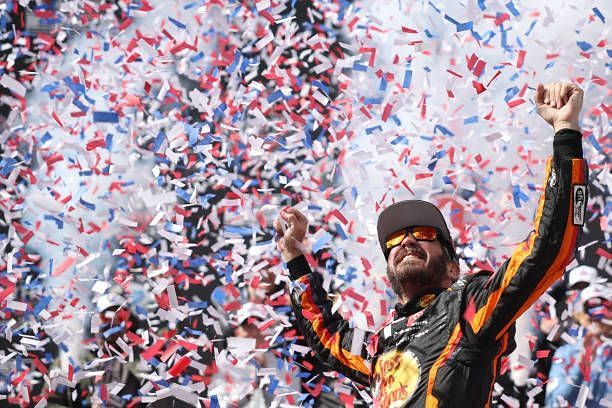 Martin Truex Jr. celebrates his victory in the 2023 race