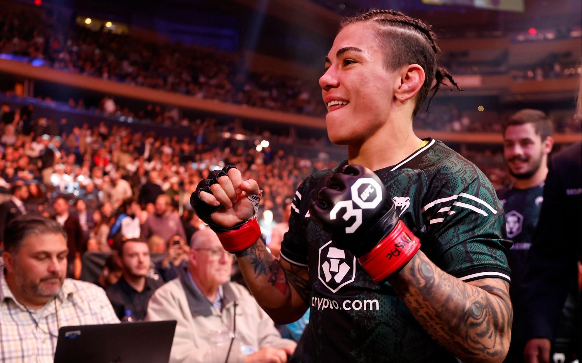 Jessica Andrade celebrates her win at UFC 295. [via Getty Images]