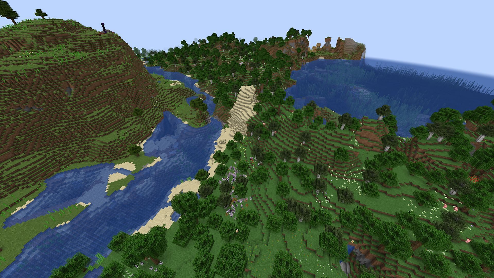 The flower forest at spawn, as well as a nearby ruined portal and village (Image via Mojang)