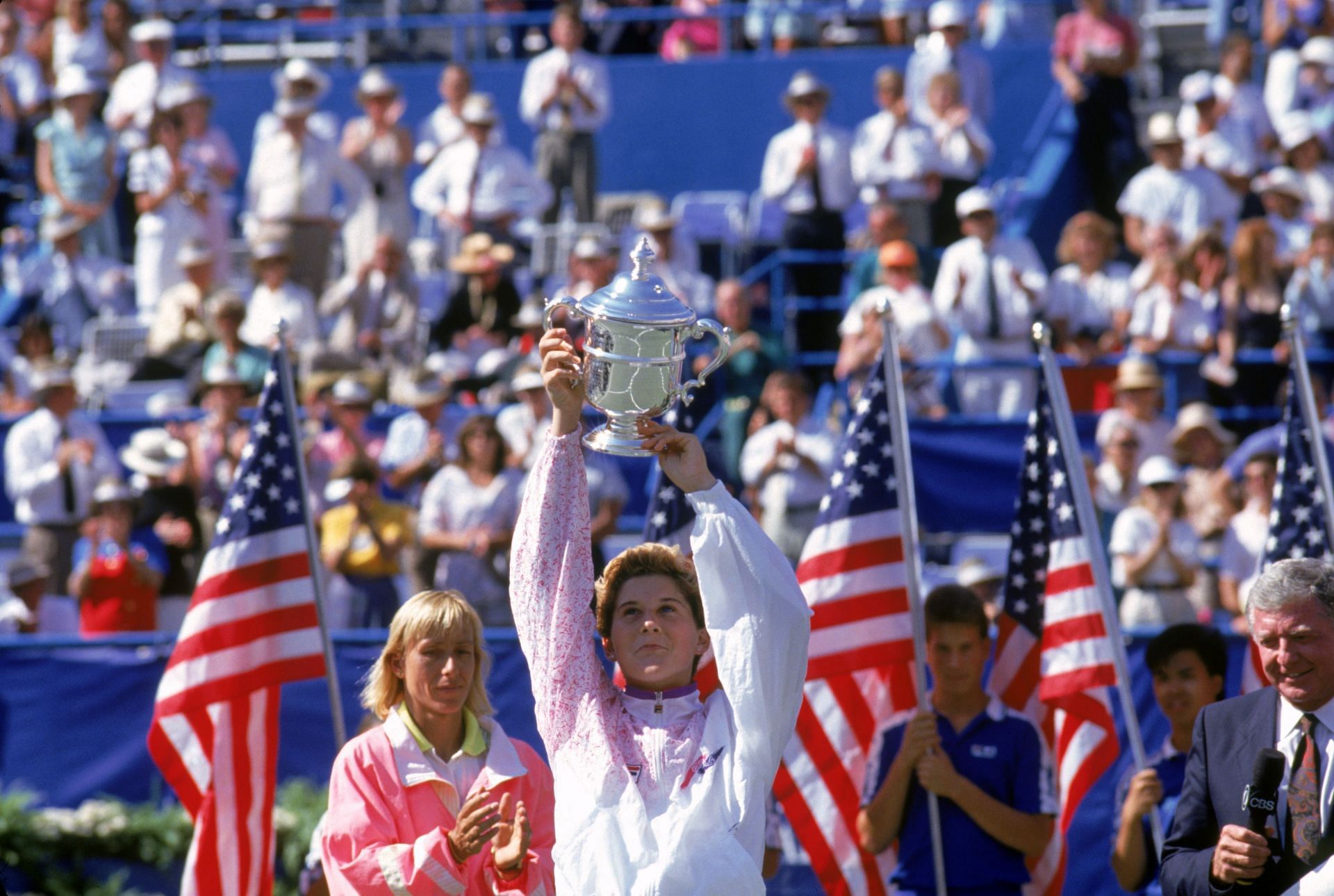 Monica Seles poses with the 1991 US Open trophy