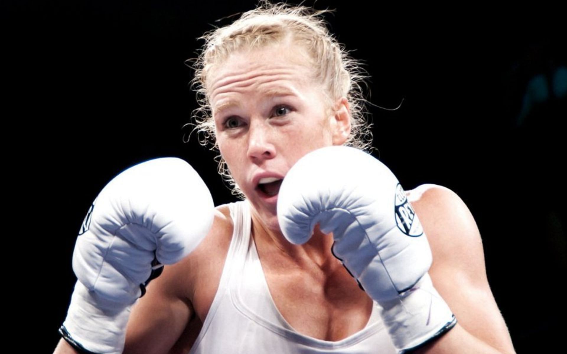 When did Holly Holm start boxing?
