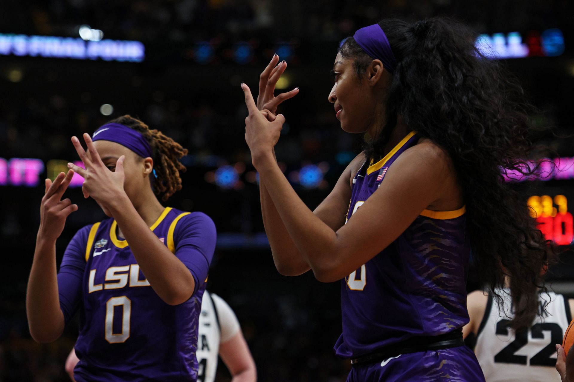 LaDazhia Williams #0 and Angel Reese #10 of the LSU Lady Tigers.