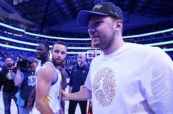 Watch: Mavericks athlete booking agent shows courtside Warriors fan switching to Luka Doncic jersey after losing bet on Dubs