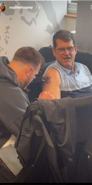 Jim Harbaugh getting a totto for Michigan's unbeaten run.