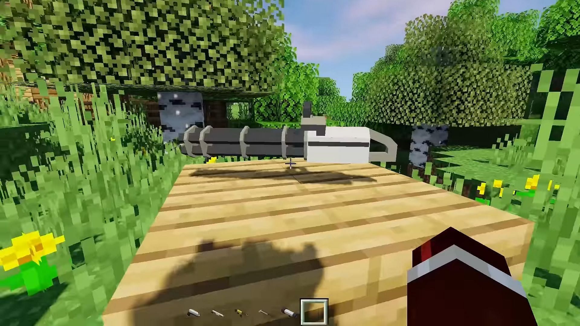 This Minecraft 1.20 gun mod adds plenty of high-caliber and explosive firepower (Image via MrCrayfish/YouTube)