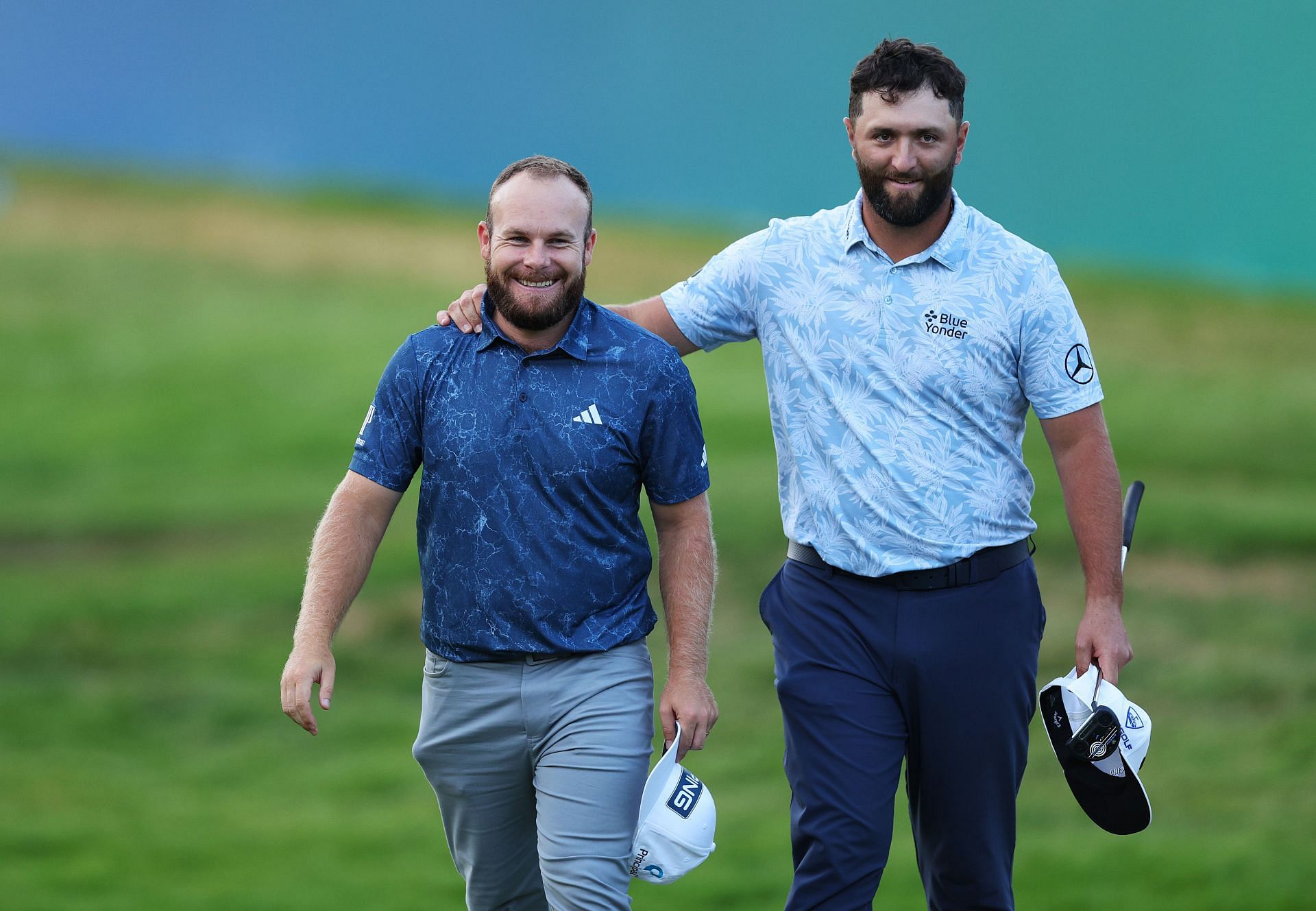 Tyrrell Hatton of England and Jon Rahm of Spain (Photo by Andrew Redington/Getty Images)