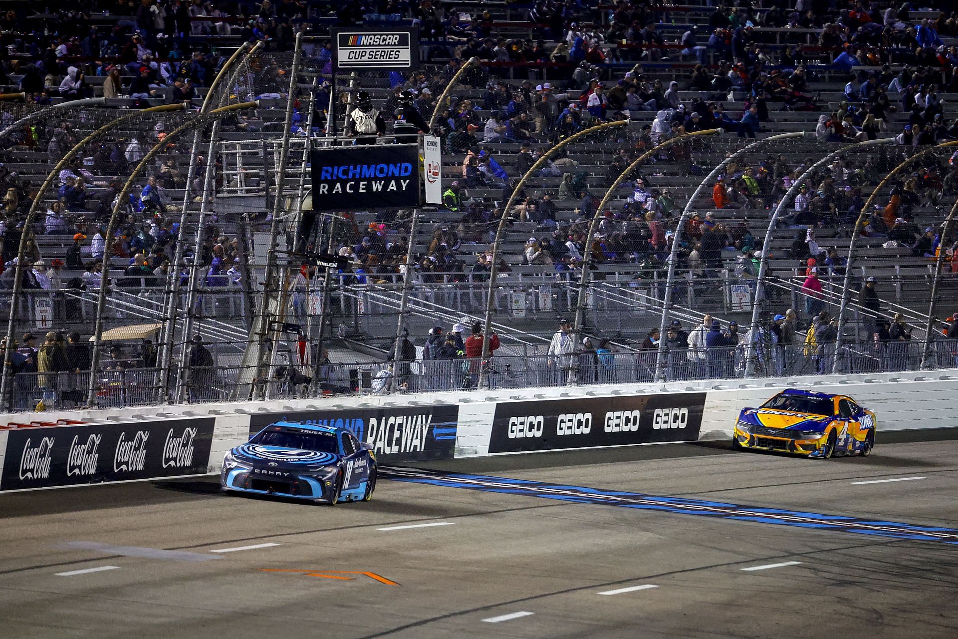 WATCH: NASCAR Fan Climbs On Top Of The Fence During The Cup Series Race ...