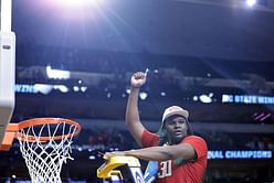 WATCH: NC State star DJ Burns shows his class by taking pictures with security after solid win over Duke in Elite Eight clash