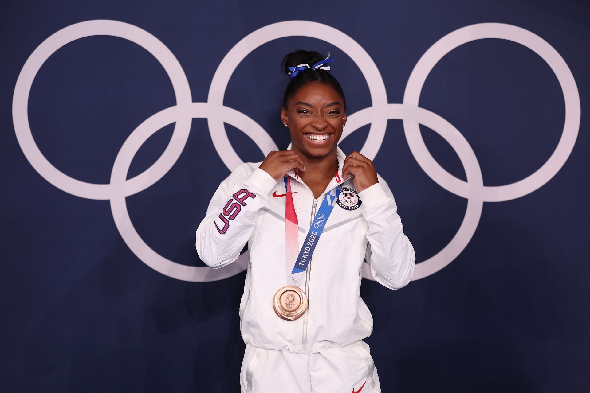 Simone Biles of Team United States poses with the bronze medal following the Women&#039;s Balance Beam Final on day eleven of the Tokyo 2020 Olympic Games at Ariake Gymnastics Centre on August 03, 2021 in Tokyo, Japan. (Photo by Jamie Squire/Getty Images)