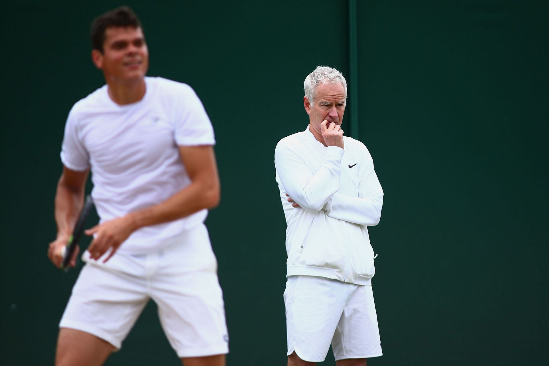 John McEnroe coaching Canadian tennis player Milos Raonic during Wimbledon 2016