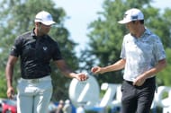 Aaron Rai hands David Lipsky a ball during the second round of the Zurich Classic of New Orleans