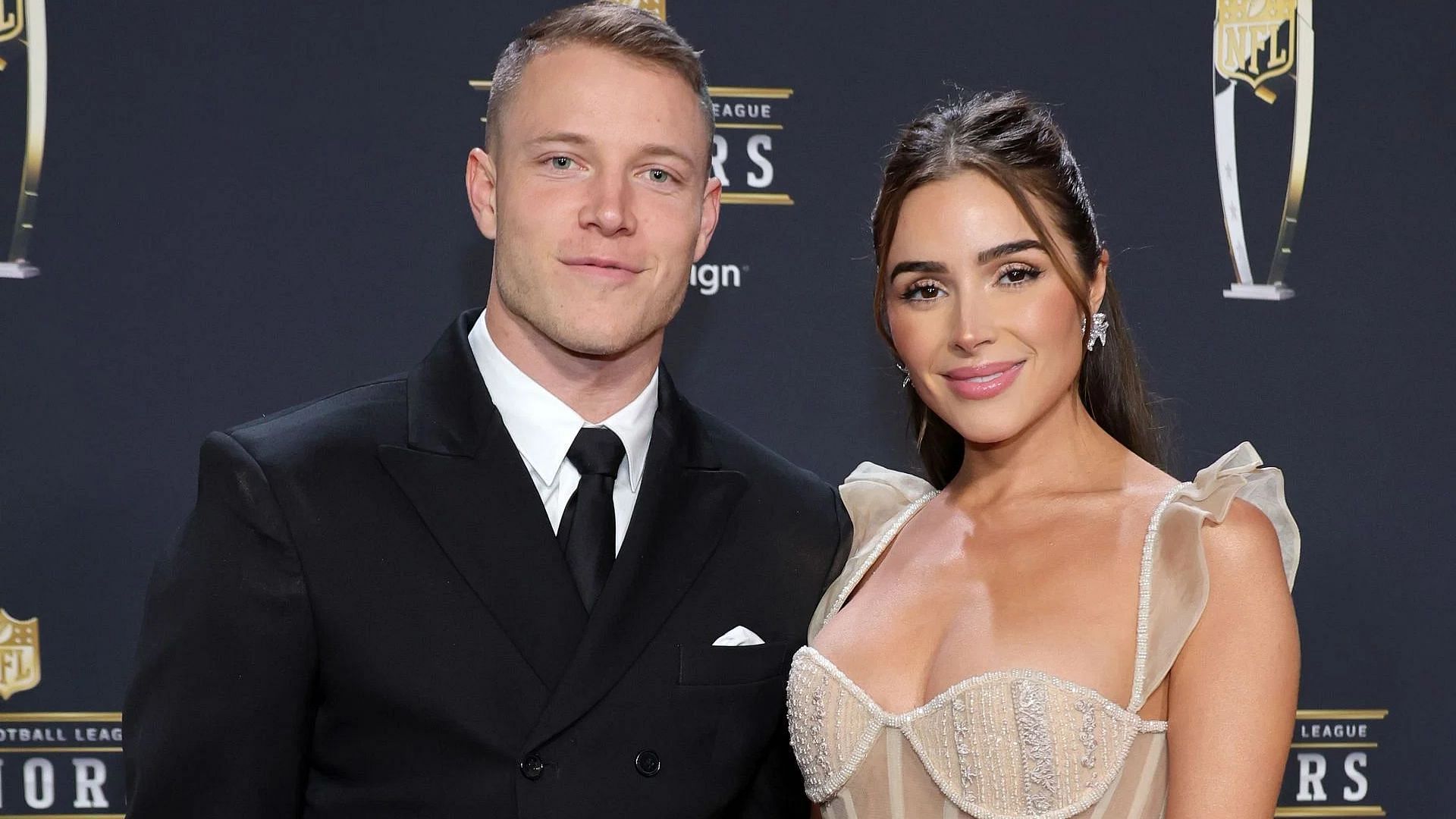 Christian McCaffrey and Olivia Culpo