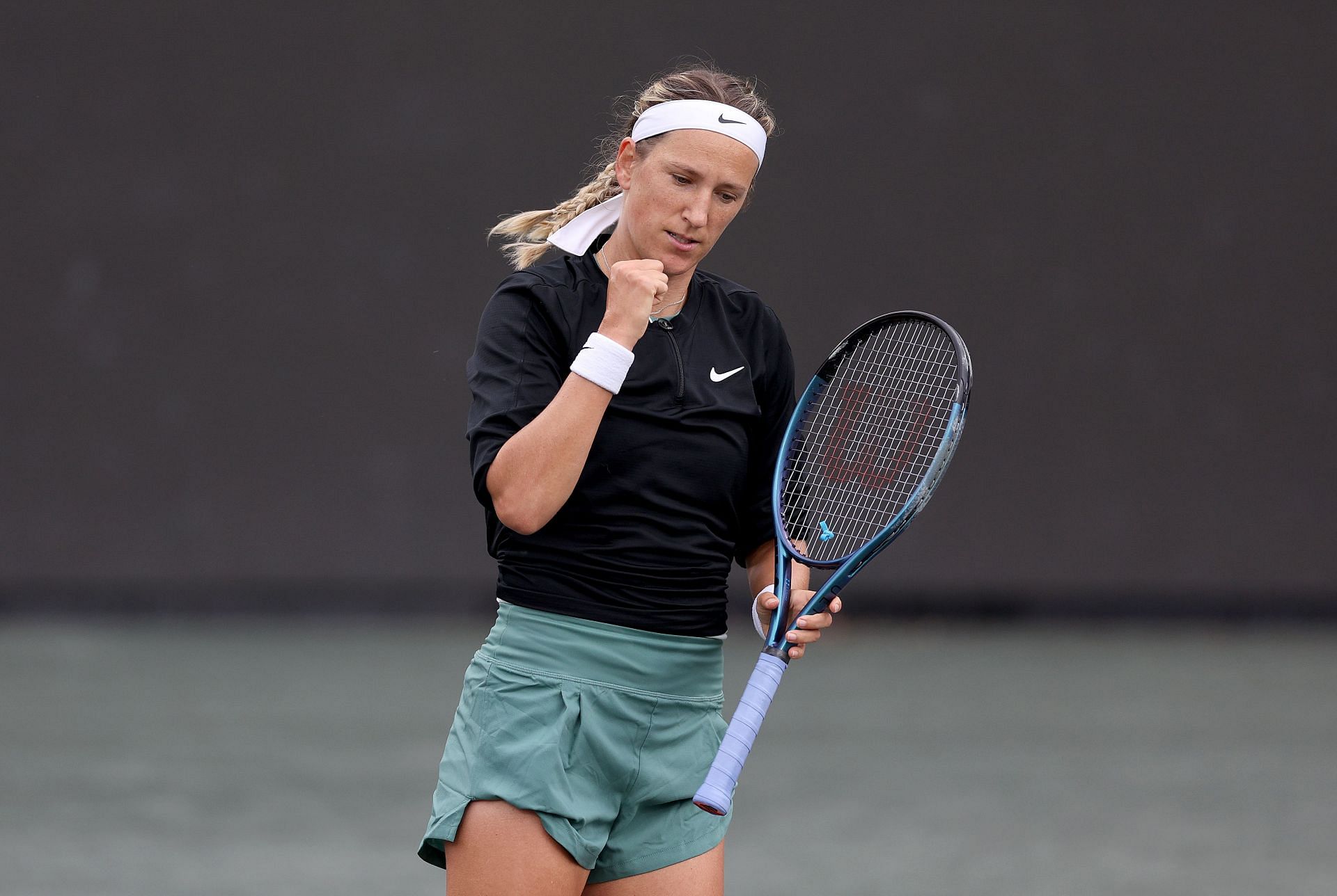Victoria Azarenka celebrates a point at Charleston Open 2024