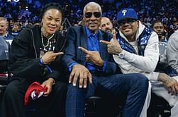 PHOTO: South Carolina HC Dawn Staley attends the Philadelphia 76ers game alongside Allen Iverson and Dr. J