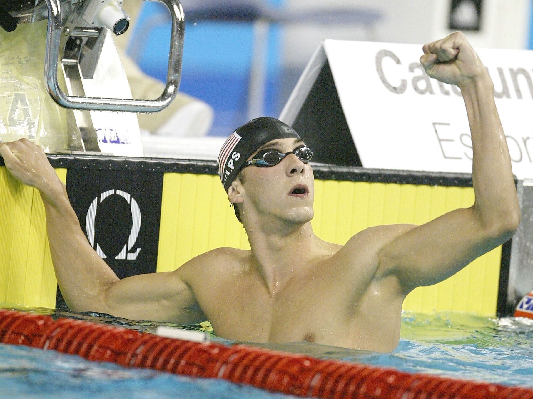 Michael Phelps of the USA celebrates getting a new World Record