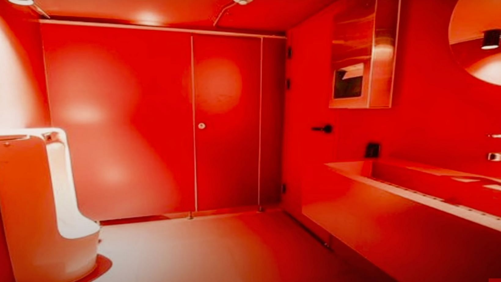 The club&#039;s &quot;Red Bathroom.&quot; (Image via BBC World Service / YouTube)