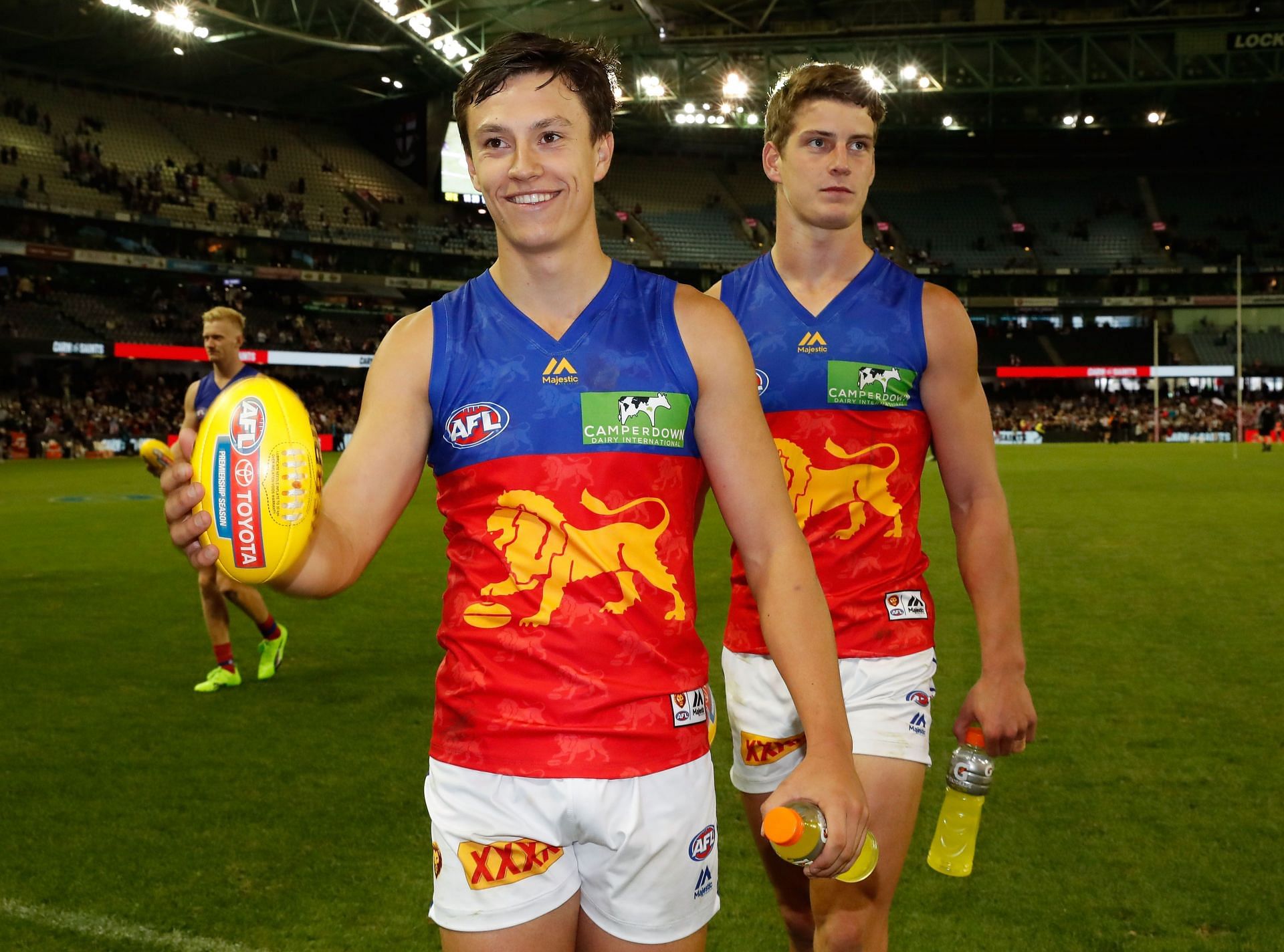 Hugh McCluggage (left) and Jarrod Berry (right) of the Brisbane Lions