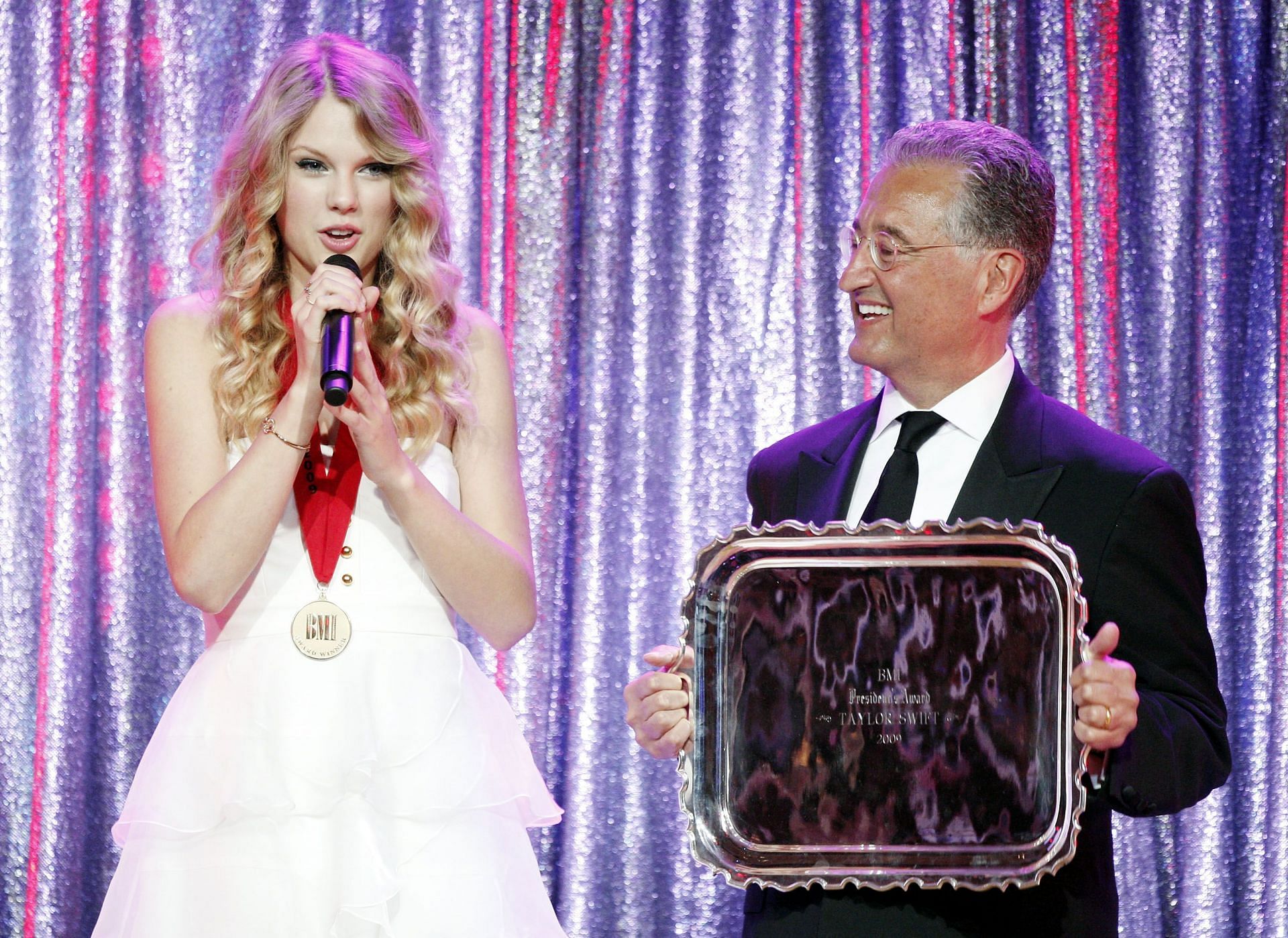 Taylor Swift receives an award for Teardrops on My Guitar at the BMI&#039;s 57th Annual Pop Awards (Photo by Kevin Winter/Getty Images)