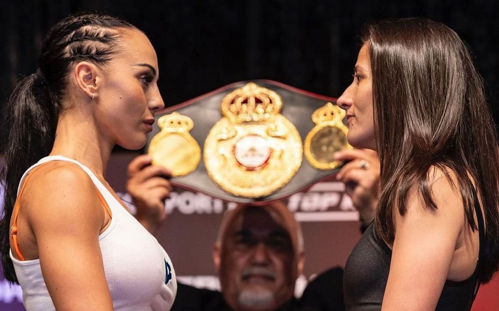 Cherneka Johnson (left) takes on Nina Hughes (right) for the WBA women