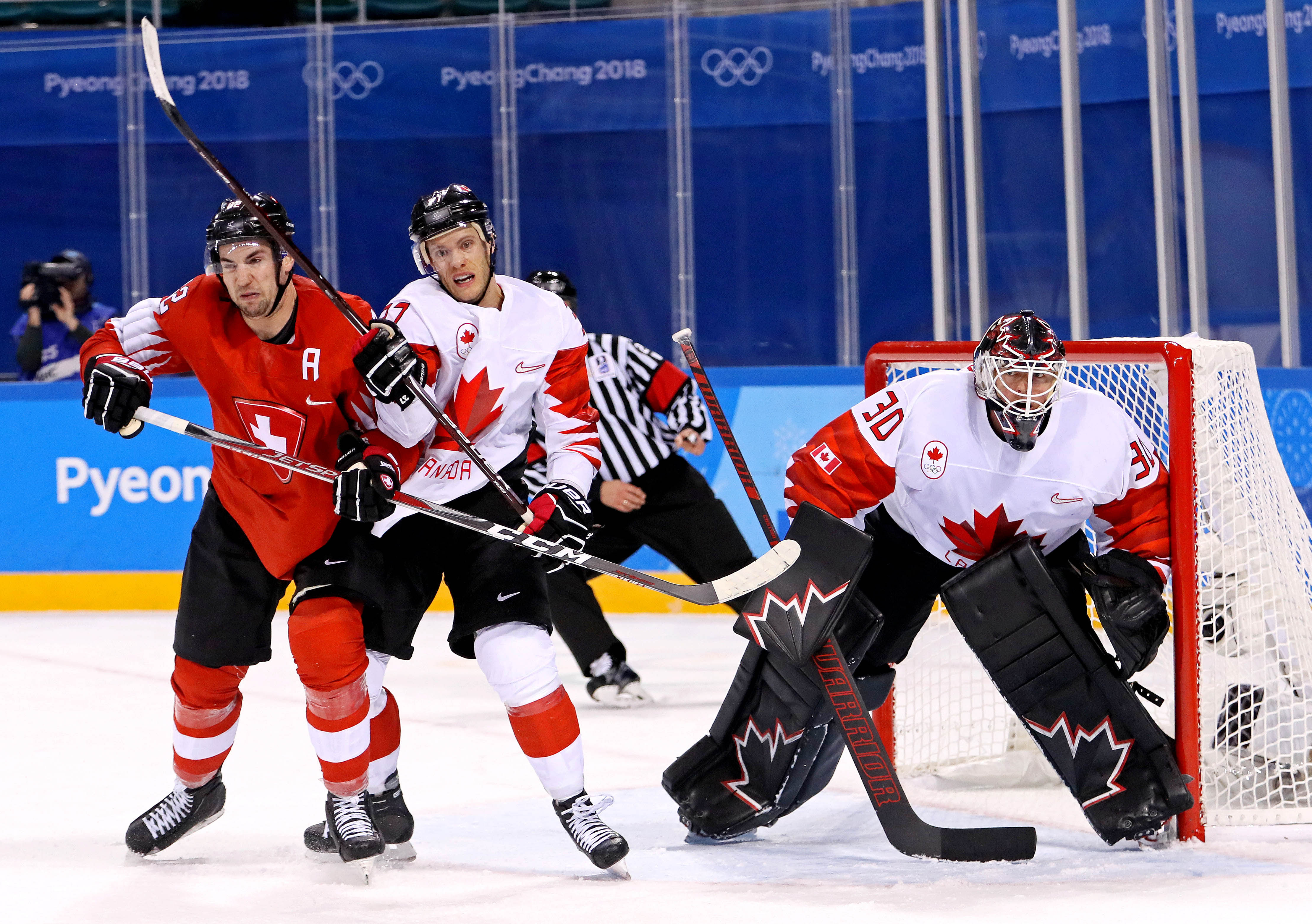 Olympics: Ice Hockey-Men Team Group A - SUI-CAN