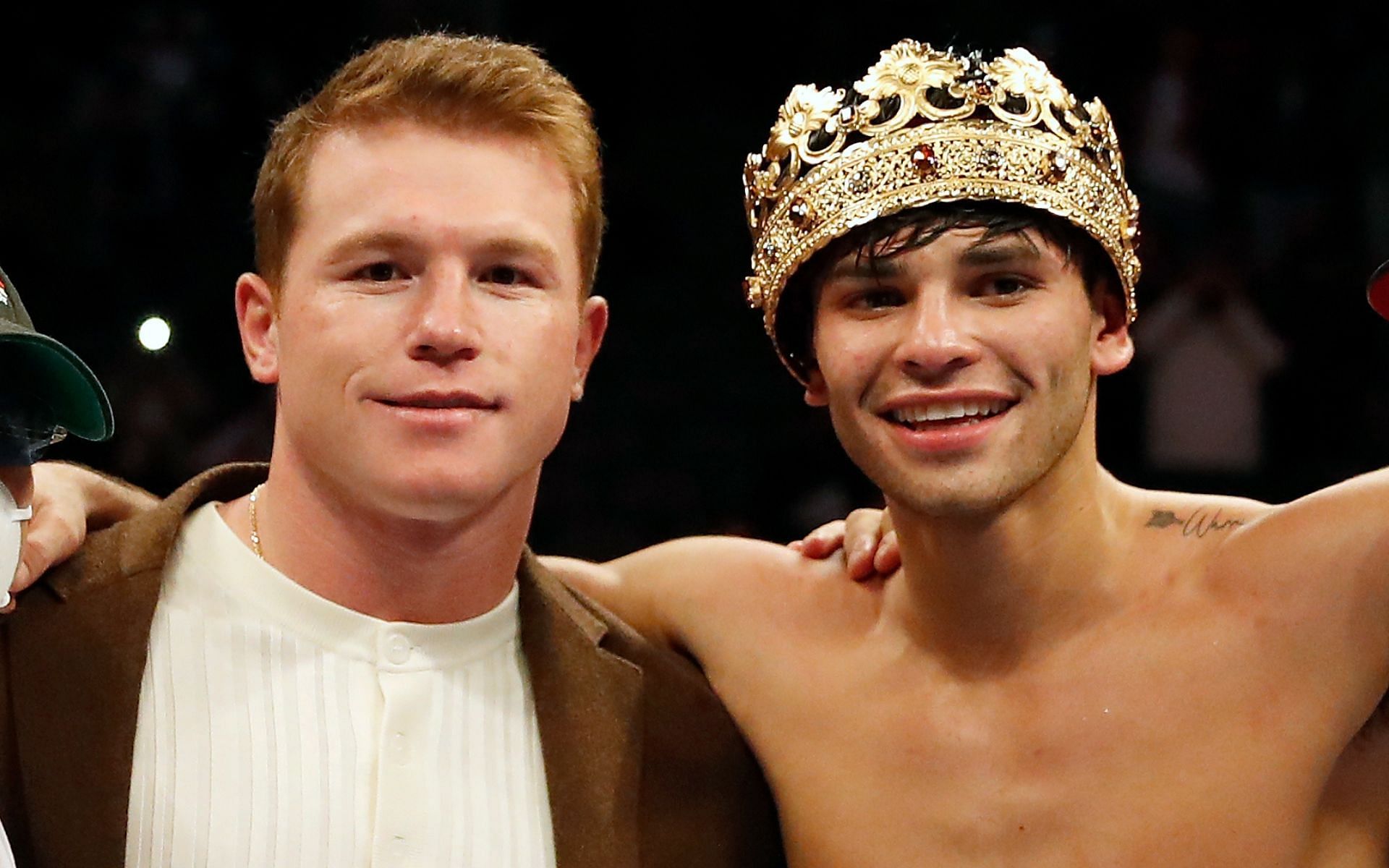 Canelo Alvarez (left) and Ryan Garcia (right) together after a boxing fight. [via Getty Images]